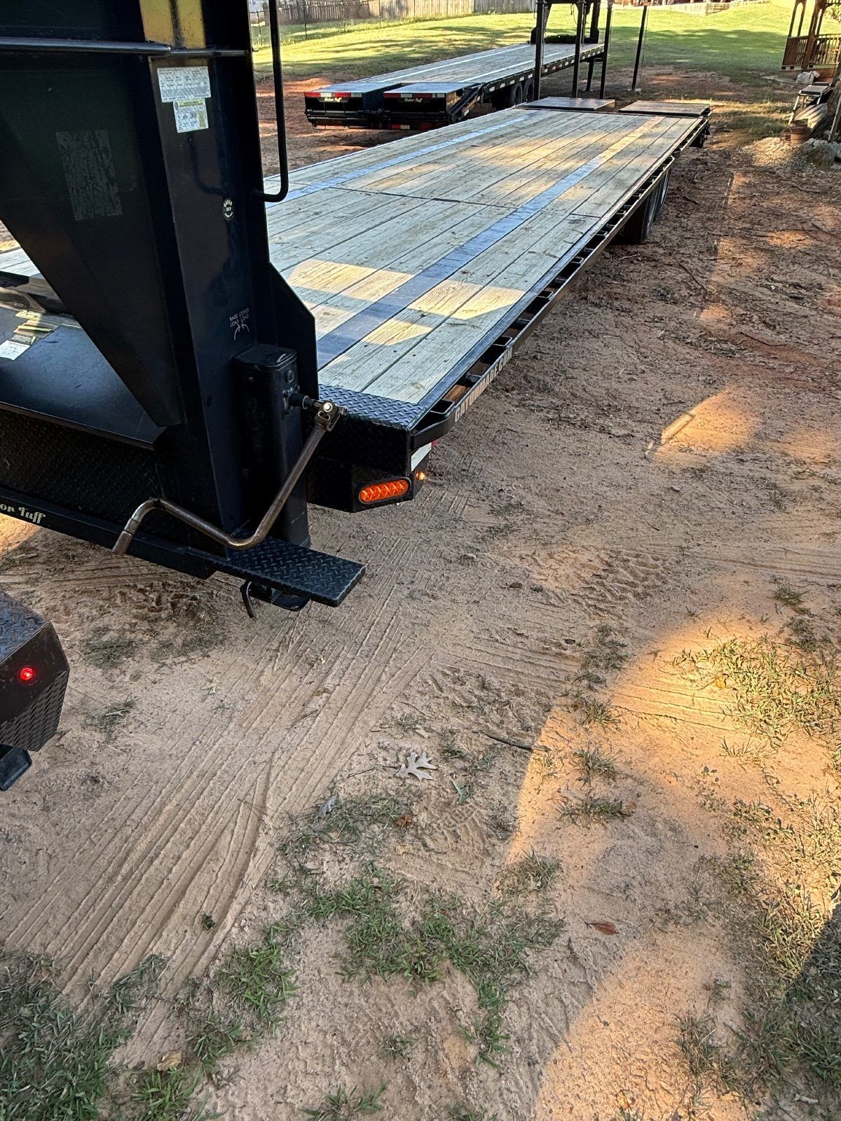 2024 Gator Made 8x35 gooseneck flatbed trailer in black, photo 2