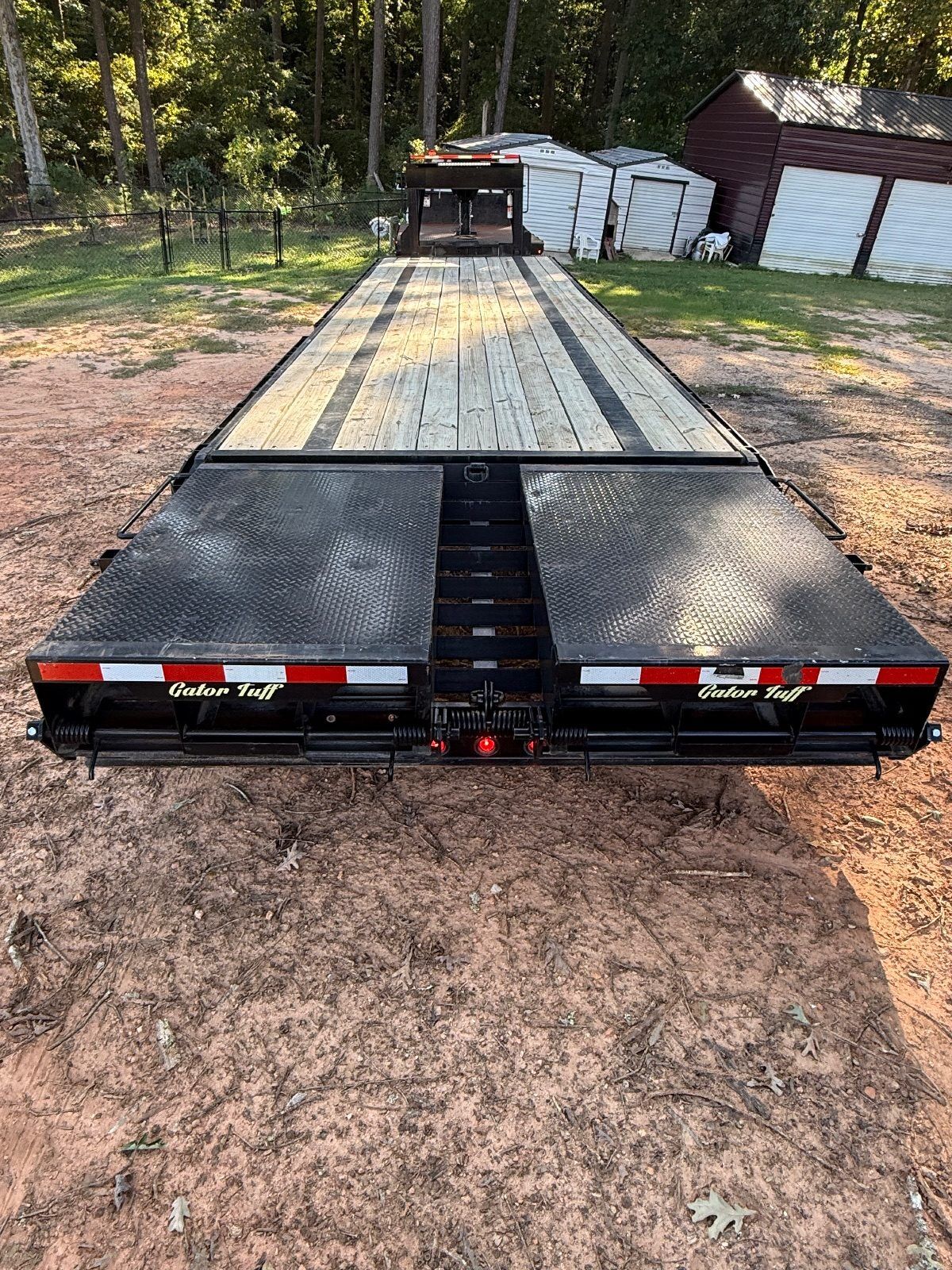 2024 Gator Made 8x35 gooseneck flatbed trailer in black, photo 6